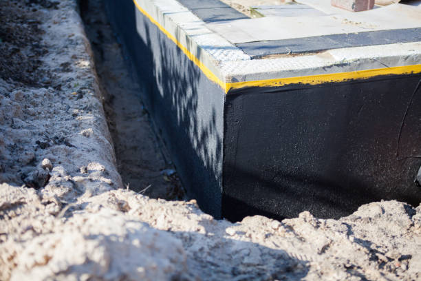 Professional Basement Waterproofing technician working in Cliffwood, NJ